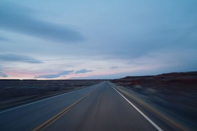 Road against sky during sunset