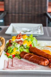 Close-up of breakfast served on table