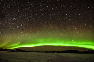 Scenic view of star field against sky at night