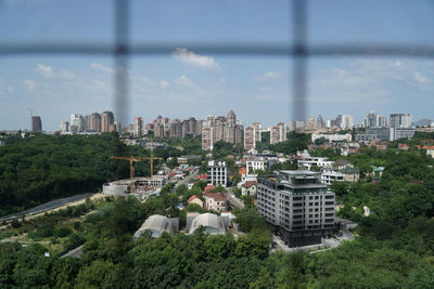 Buildings in city against sky