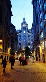 People walking on city street