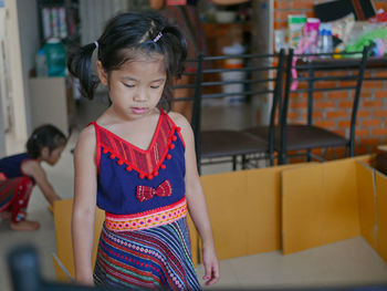 Cute girl looking at home