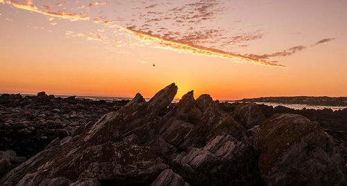 View of rocks at sunset