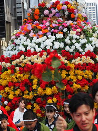 Close-up of woman holding flowers