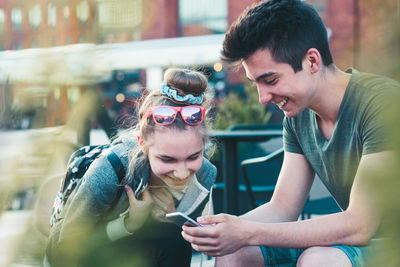 Young man using mobile phone