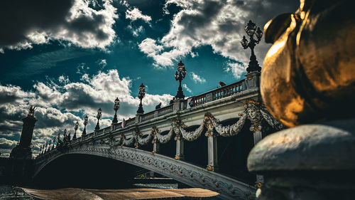 Low angle view of eiffel tower against sky