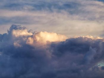 Low angle view of clouds in sky during sunset