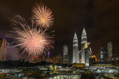 Firework display at night