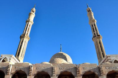 Low angle view of cathedral against blue sky