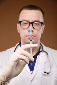 Portrait of young man wearing eyeglasses