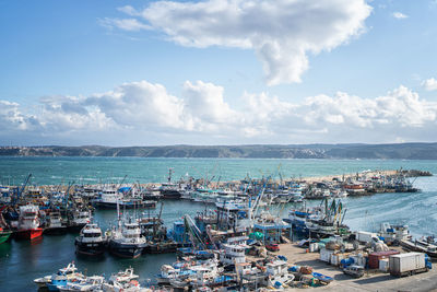 High angle view of boats moored in harbor