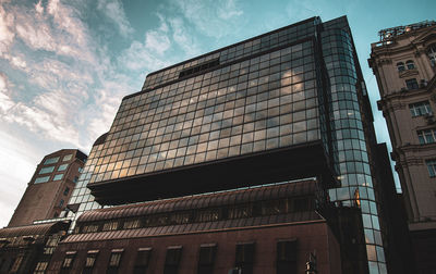 Low angle view of modern building against sky