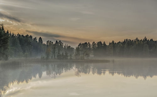 Scenic view of lake against sky during sunset at lammi