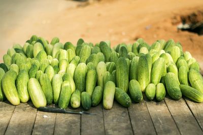 Close-up of cucumbers on wooden table