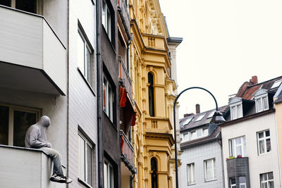 Low angle view of buildings against clear sky