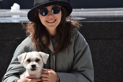 Portrait of woman with dog