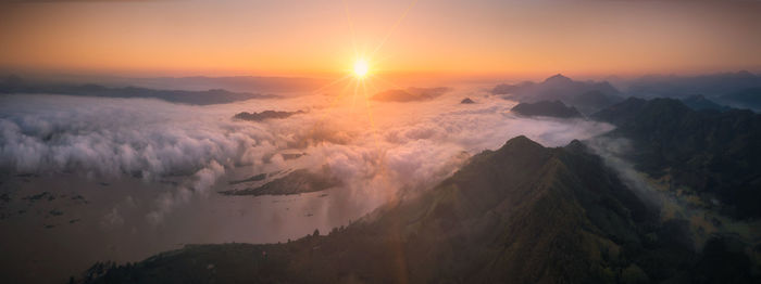 Panoramic view of landscape against sky during sunset