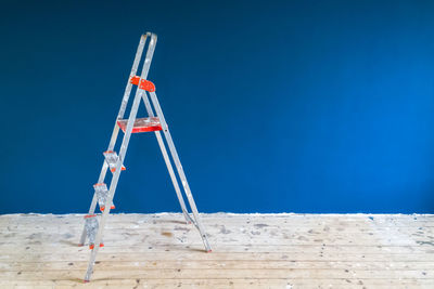 Ladder in empty room