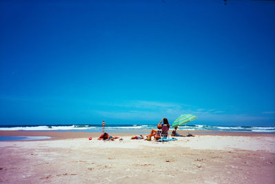 People sitting on beach