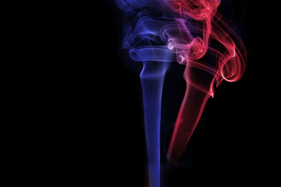 Close-up of smoke against black background