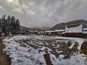 Scenic view of snow covered mountain against sky