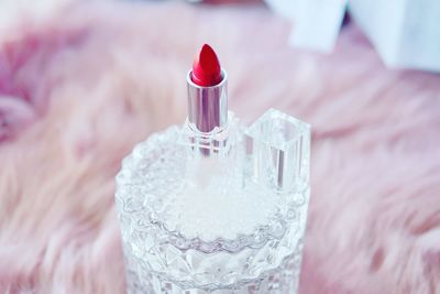 Close-up of lipstick on a glass