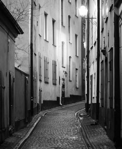 Walkway amidst buildings