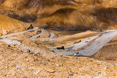 Panoramic view of road leading towards mountains