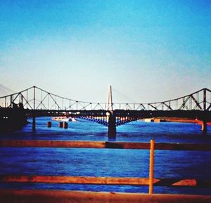 Suspension bridge over river