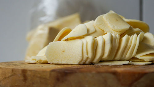 Close-up of cake slice on cutting board