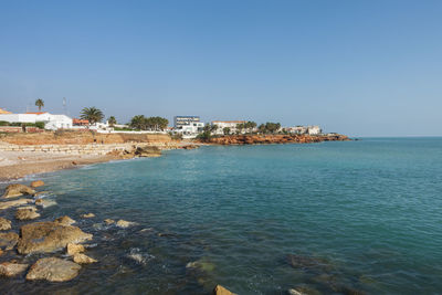 Scenic view of sea against clear sky