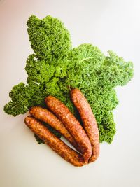 High angle view of vegetables on white background