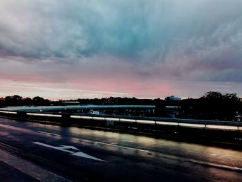 View of road against cloudy sky