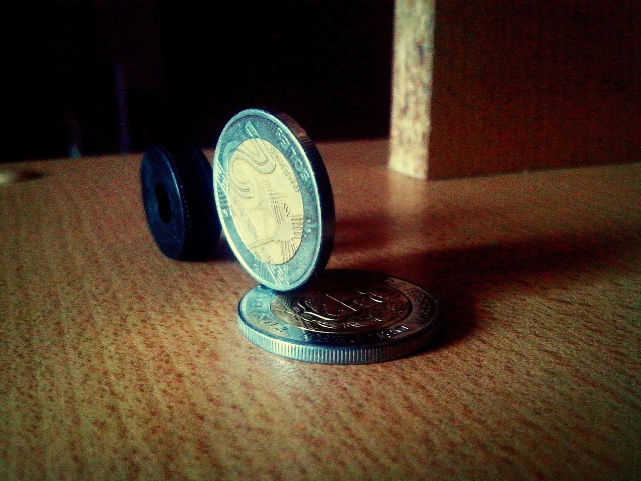 CLOSE-UP VIEW OF COINS