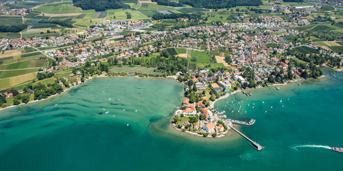 High angle view of city by sea