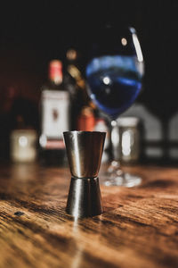 Close-up of beer glass on table