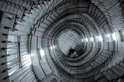 Low angle view of spiral staircase in building