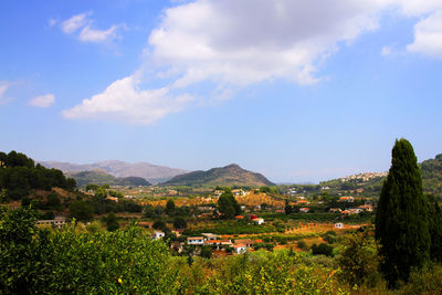 Scenic view of townscape against sky