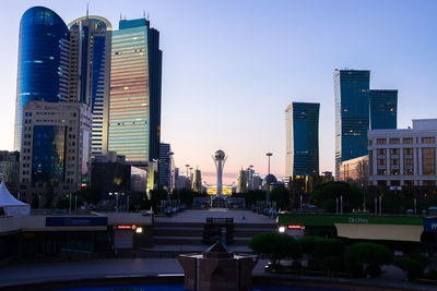 Modern buildings in city against sky
