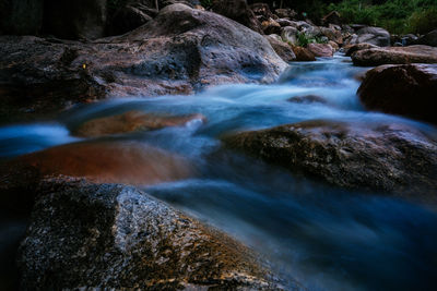 Stream flowing through rocks