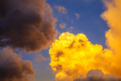 Low angle view of yellow orange sky