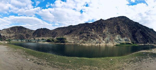 Scenic view of lake against mountain range