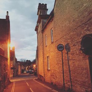 Street in city against sky