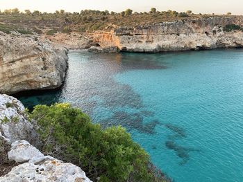 High angle view of rocks on sea