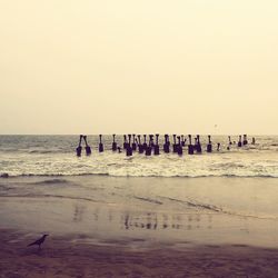 Scenic view of beach against clear sky