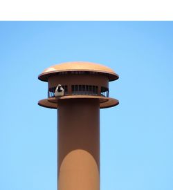 Low angle view of built structure against blue sky