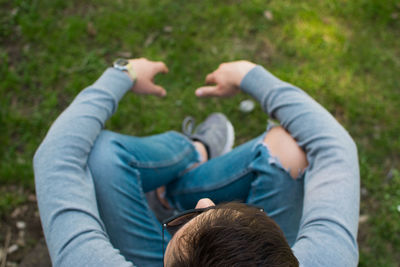 Low section of woman on grass