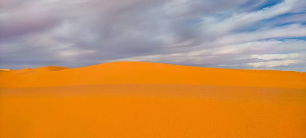 Scenic view of desert against sky