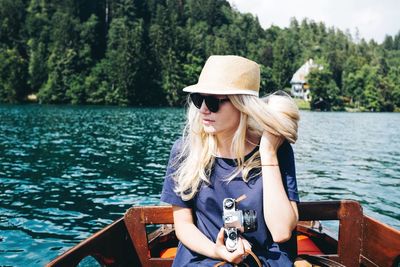 Woman sitting in lake