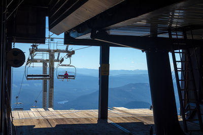 Chairlift against mountains